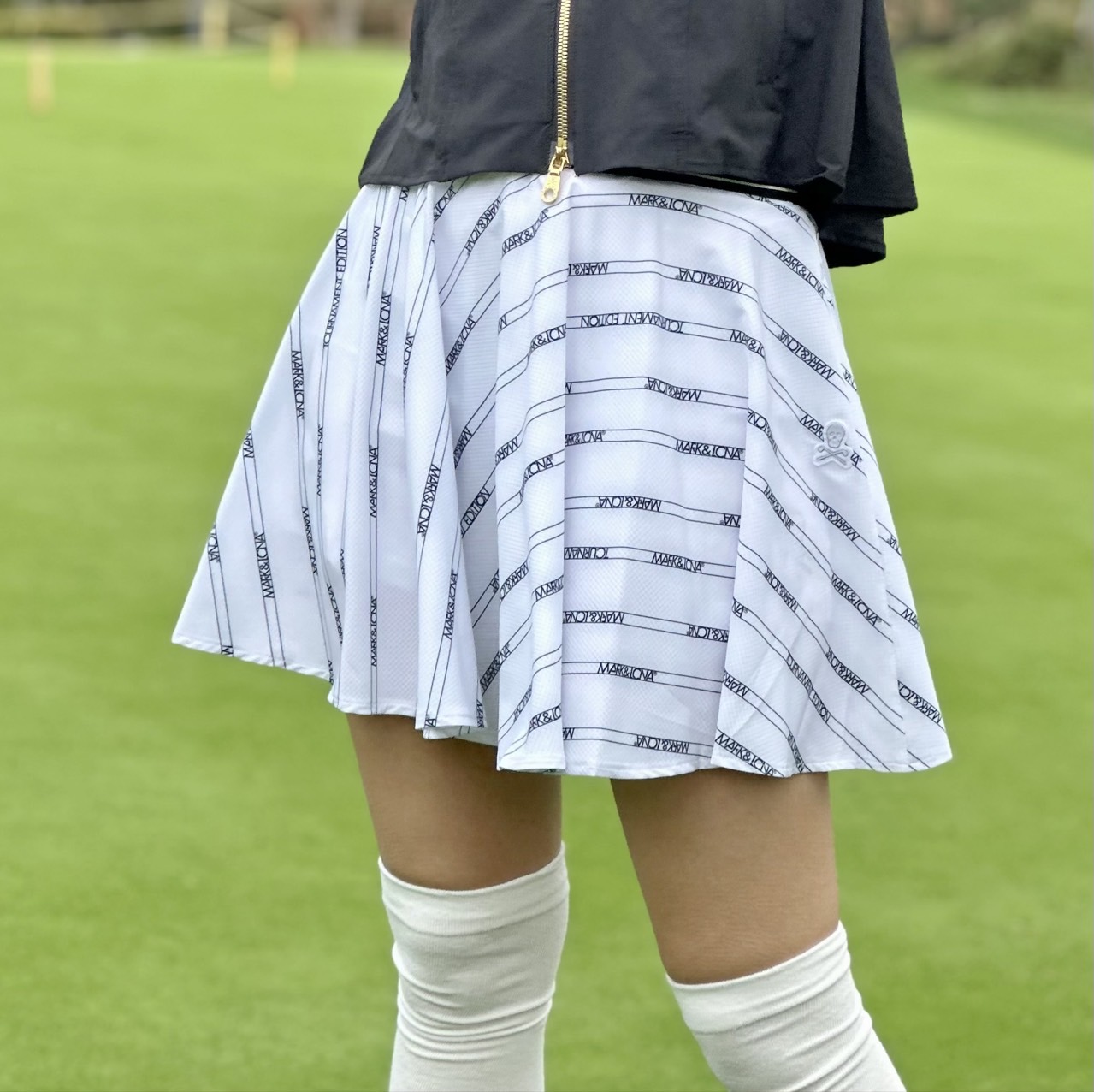 MARK & RONA 우먼 토너먼트 에어 홀 플레어 스커트